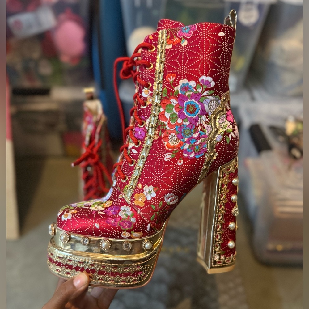 Red and Gold Heeled Boots with Ornate Floral Design